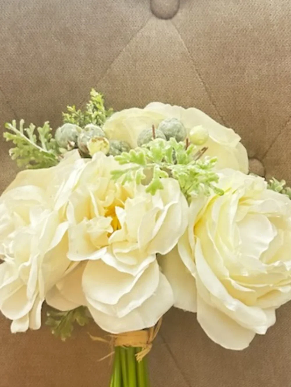 Delicate White Cream Bridal Bouquet With Berries and Greenery